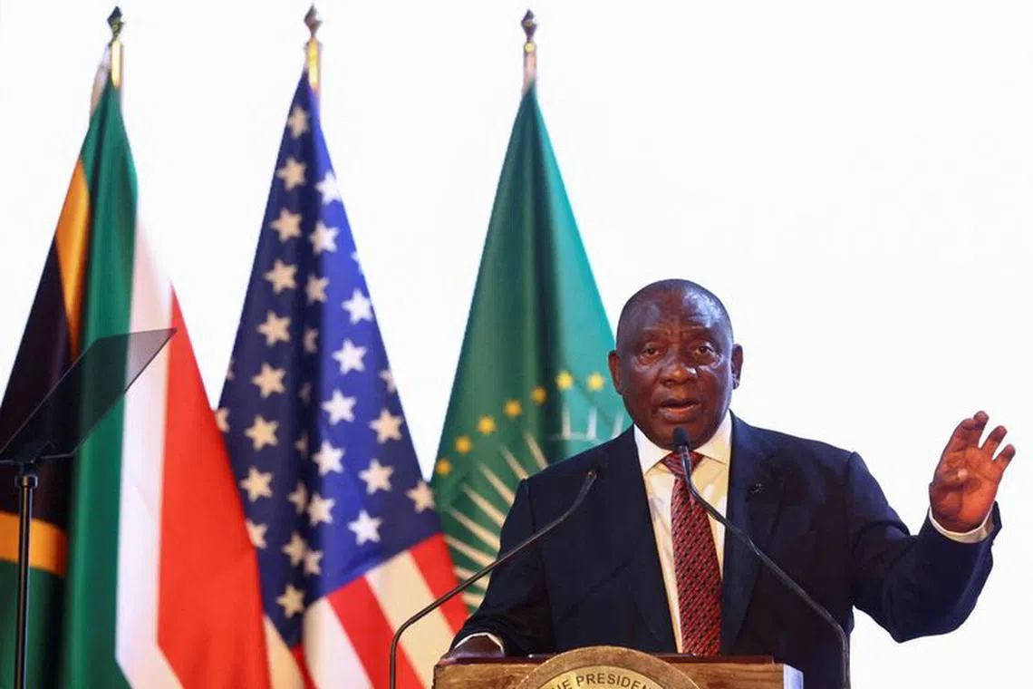 South African President Cyril Ramaphosa gestures during the opening of the U.S.-sub-Saharan Africa trade forum to discuss the future of the African Growth and Opportunity Act (AGOA), at the NASREC conference center in Johannesburg, South Africa, November 3, 2023. REUTERS/Siphiwe Sibeko/File Photo