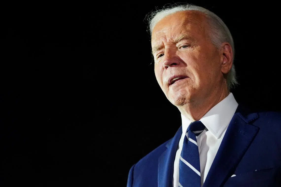 FILE PHOTO: U.S. President Joe Biden looks on at Joint Base Andrews in Maryland, U.S., August 1, 2024. REUTERS/Nathan Howard/File Photo