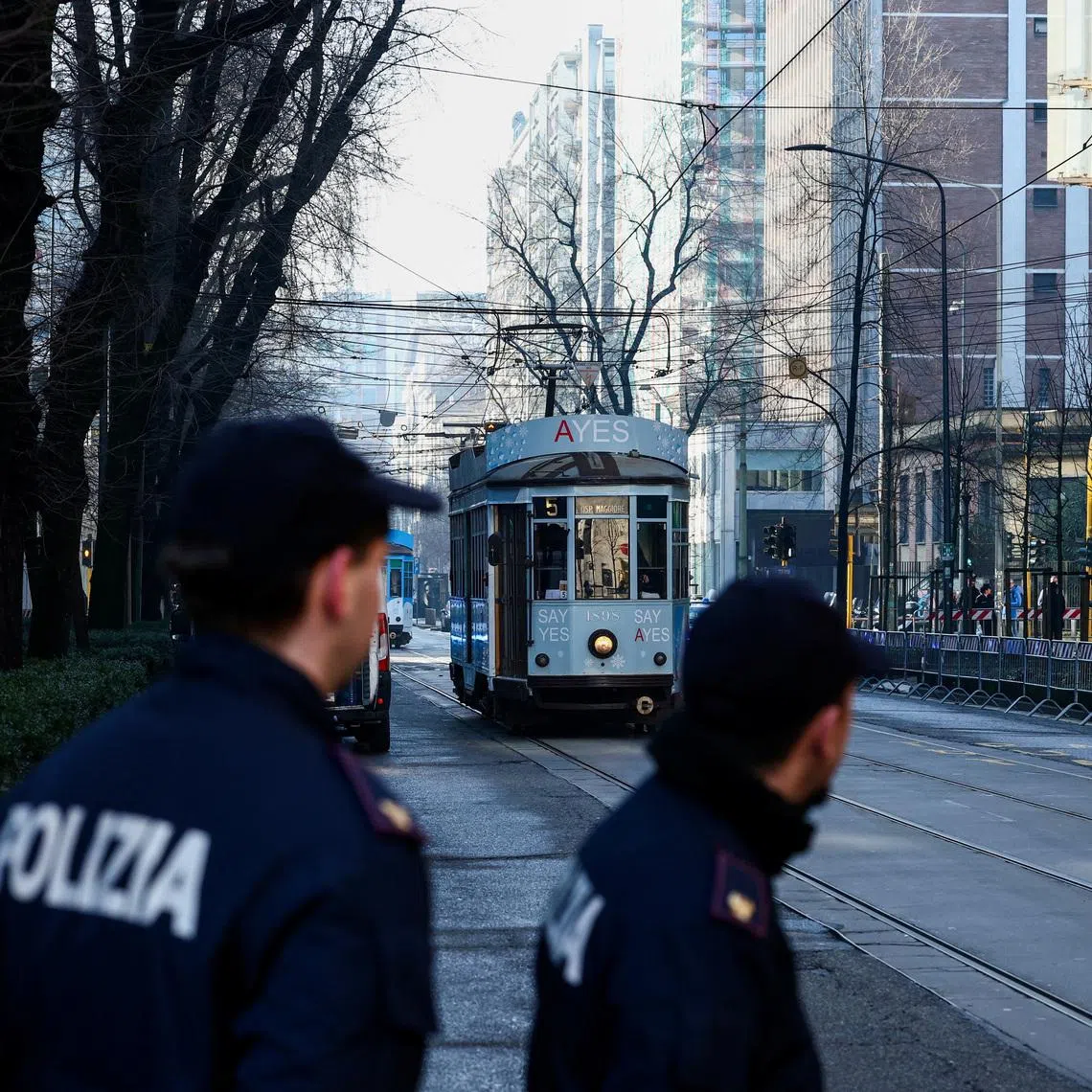 Italian police officers stand guard near the Excelsior Hotel Gallia, on the day of the expected arrival of U.S. Vice President JD Vance, ahead of the Milano Cortina 2026 Winter Olympic Games in Milan, Italy, February 5, 2026. REUTERS/Guglielmo Mangiapane