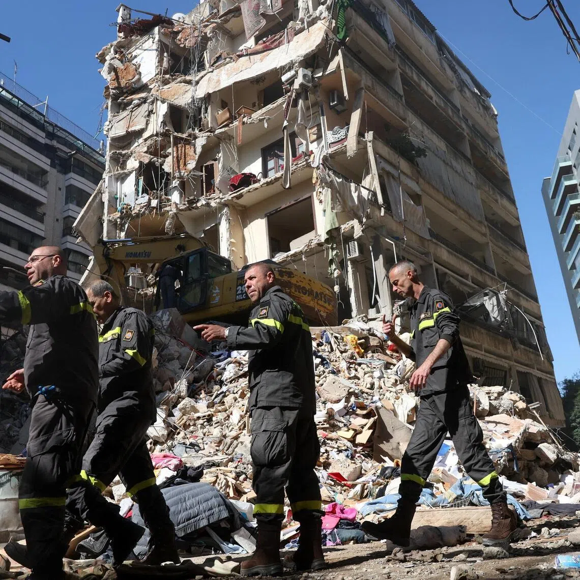 Rescuers work at the site of an Israeli strike carried out in Beirut, Lebanon.
