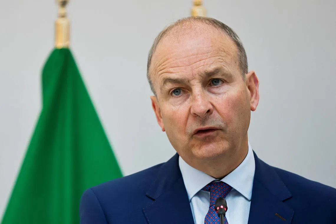 Ireland's Foreign Minister Micheal Martin holds a press conference with Spanish Foreign Minister Jose Manuel Albares and Norway's Foreign Minister Espen Barth Eide in Brussels, Belgium May 27, 2024.REUTERS/Johanna Geron