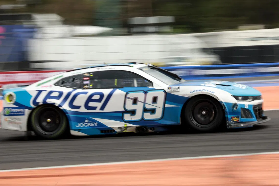FILE PHOTO: NASCAR - NASCAR Cup Series Mexico - Autodromo Hermanos Rodriguez, Mexico City, Mexico - June 15, 2025 Trackhouse Racing's Daniel Suarez during the race REUTERS/Henry Romero/File Photo