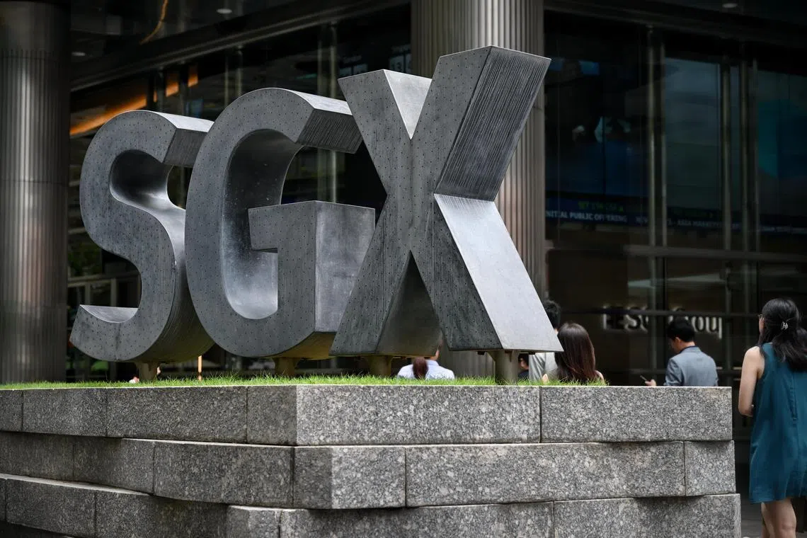 ST20240422_202439334845 Kua Chee Siong/ pixgeneric/ Generic pix of the lunchtime crowd walking next to the SGX logo at the SGX Centre 1, located in Shenton Way, on April 22, 2024.
