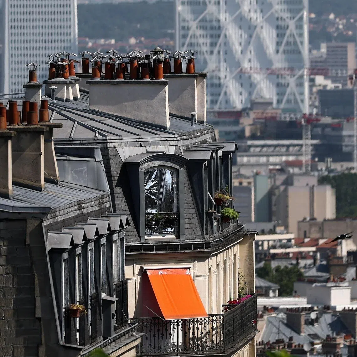 Steep temperatures often turn apartments directly under iconic Haussmann-era buildings with zinc-covered roofs into virtual ovens.