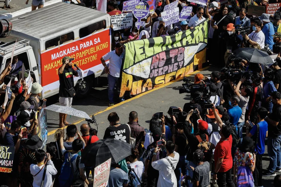 Transport union members hold a rally as part of a transport strike along a main thoroughfare in Quezon City, Metro Manila, on March 6.
