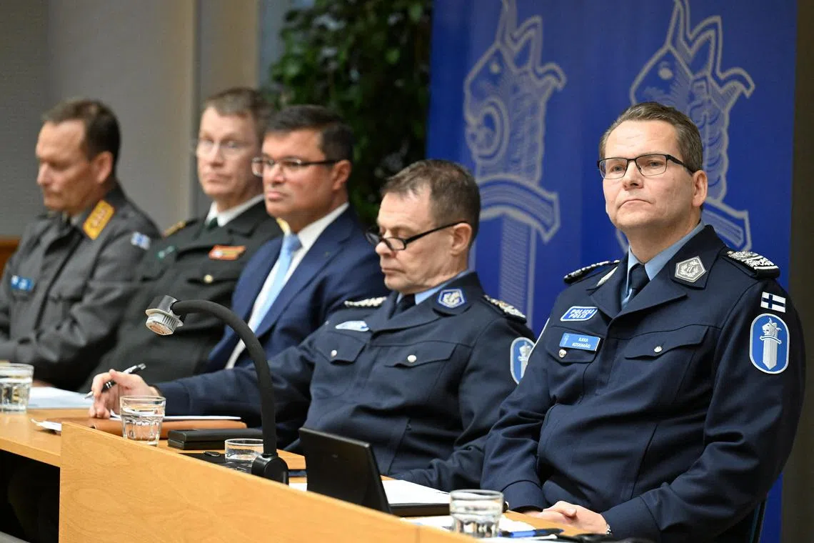 Finnish officials from the police and the National Bureau of Investigation delivering a press conference on the cable damage, on Dec 26 in Helsinki.