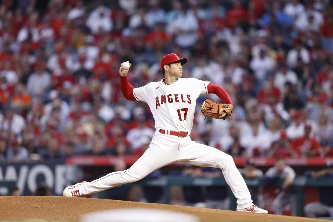 Japan's Shohei Ohtani, seen here in action against the Houston Astros in 2022, has a combination of elite pitching and hitting prowess that has earned him comparisons to the legendary Babe Ruth.