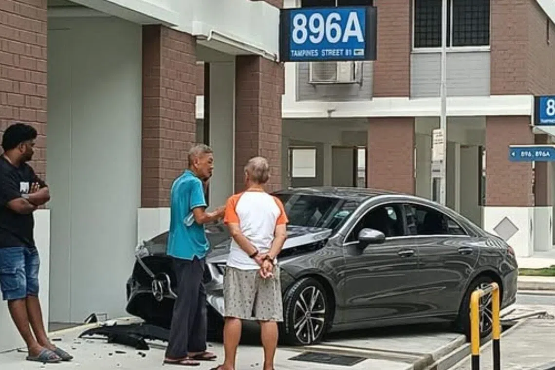 A car that was believed to have skidded along the service road of Block 896A Tampines Street 81.