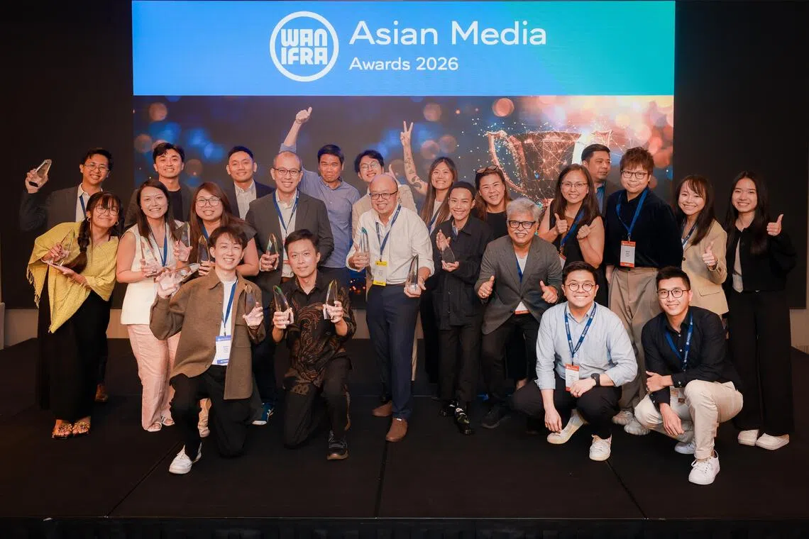 SPH Media managing director Kuek Yu Chuang (back row, fourth from left) with SPH Media winners and attendees at the WAN-IFRA Asian Media Awards on Oct 26.