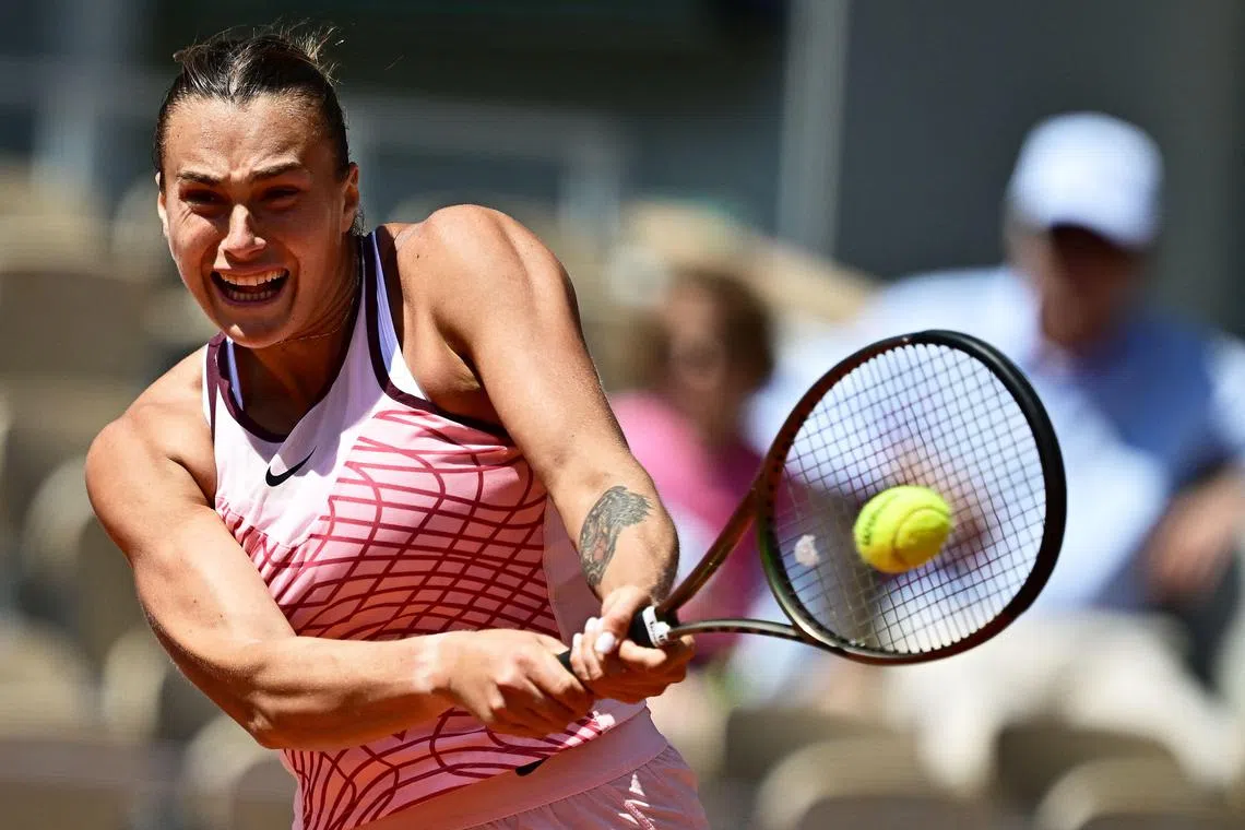 Belarus' Aryna Sabalenka plays a backhand return to Russia's Kamilla Rakhimova during their women's singles match on day six of the French Open tennis tournament at the Court Philippe-Chatrier in Paris on Friday. She won 6-2, 6-2 but refused to attend the mandatory post-match news conference.