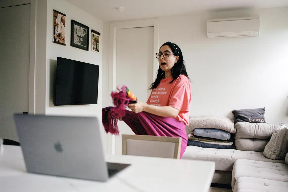 doula18 - Ms Kanwal Haq, a doula, demonstrates virtually how her client could use a scarf to relieve pressure in the hips during pregnancy, at her home in New York, May 31, 2024. Caregivers who deliver support in pregnancy and childbirth have gone virtual. 


Credit: NYTIMES