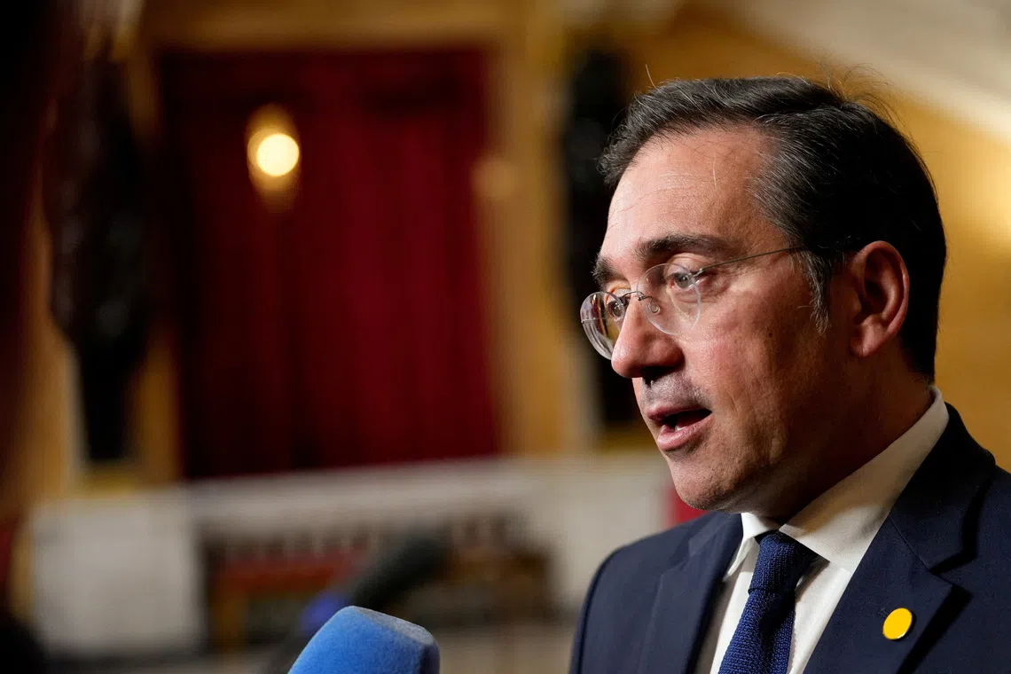 FILE PHOTO: Spain's Foreign Minister Jose Manuel Albares Bueno speaks to the media at Lancaster House in London, Britain, May 12, 2025. REUTERS/Carlos Jasso/Pool/File Photo