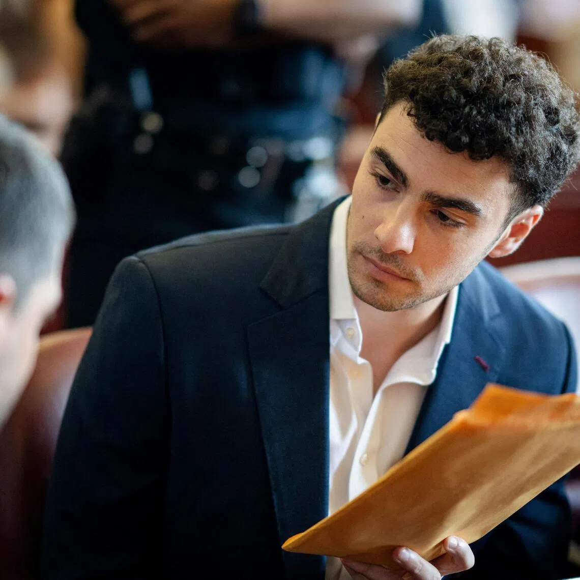 Luigi Mangione appears for a pre-trial hearing at Manhattan Criminal Court in New York, on June 17.