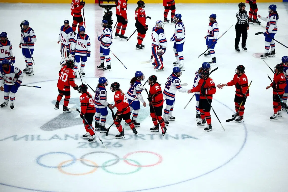 Milano Cortina 2026 Olympics - Ice Hockey - Women's Preliminary Round - Group A - Canada vs United States - Milano Santagiulia Ice Hockey Arena, Milan, Italy - February 10, 2026. General view as Canada and United States players shake hands after the match REUTERS/Guglielmo Mangiapane