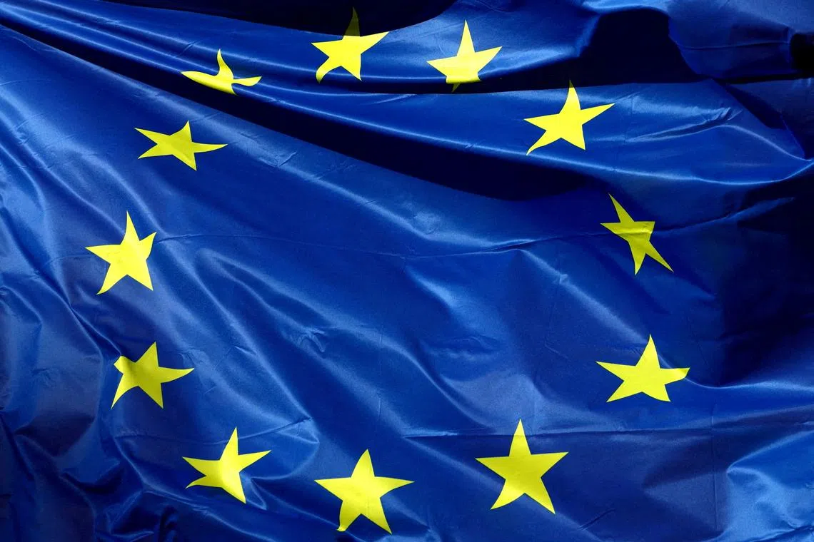 FILE PHOTO: A European Union flag flutters outside the EU Commission headquarters, in Brussels, Belgium, February 1, 2023 REUTERS/Yves Herman/File Photo