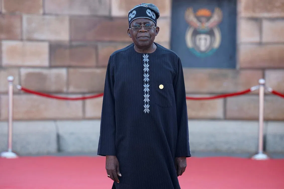 FILE PHOTO: Nigerian President Bola Tinubu arrives ahead of the inauguration of South Africa's Cyril Ramaphosa as President at the Union Buildings in Pretoria on June 19, 2024. PHILL MAGAKOE/Pool via REUTERS/File Photo
