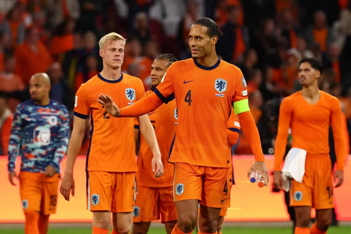 Soccer Football - FIFA World Cup - UEFA Qualifiers - Group G - Netherlands v Finland - Johan Cruyff Arena, Amsterdam, Netherlands - October 12, 2025  Netherlands' Virgil van Dijk celebrates after the match REUTERS/Piroschka Van De Wouw