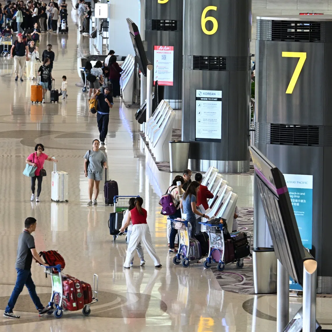 Generic photo of passengers at the departure hall of Changi Airport Terminal 4 on July 16, 2025. Can be used for aviation, air travel, tourists etc stories