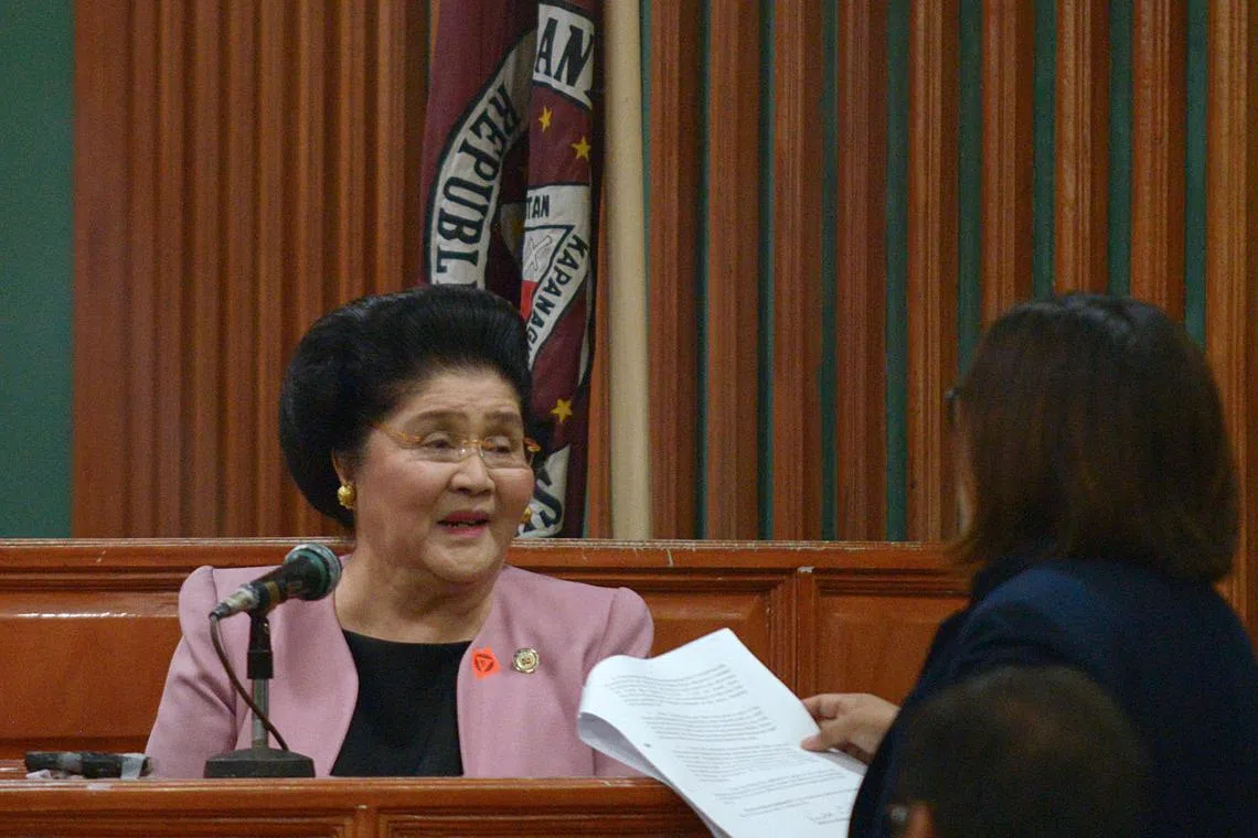 FILE PHOTO: Former Philippine First Lady Imelda Marcos takes the witness stand at the anti-corruption court Sandiganbayan in Quezon City, Metro Manila, in Philippines November 16, 2018.  REUTERS/Eloisa Lopez/File photo