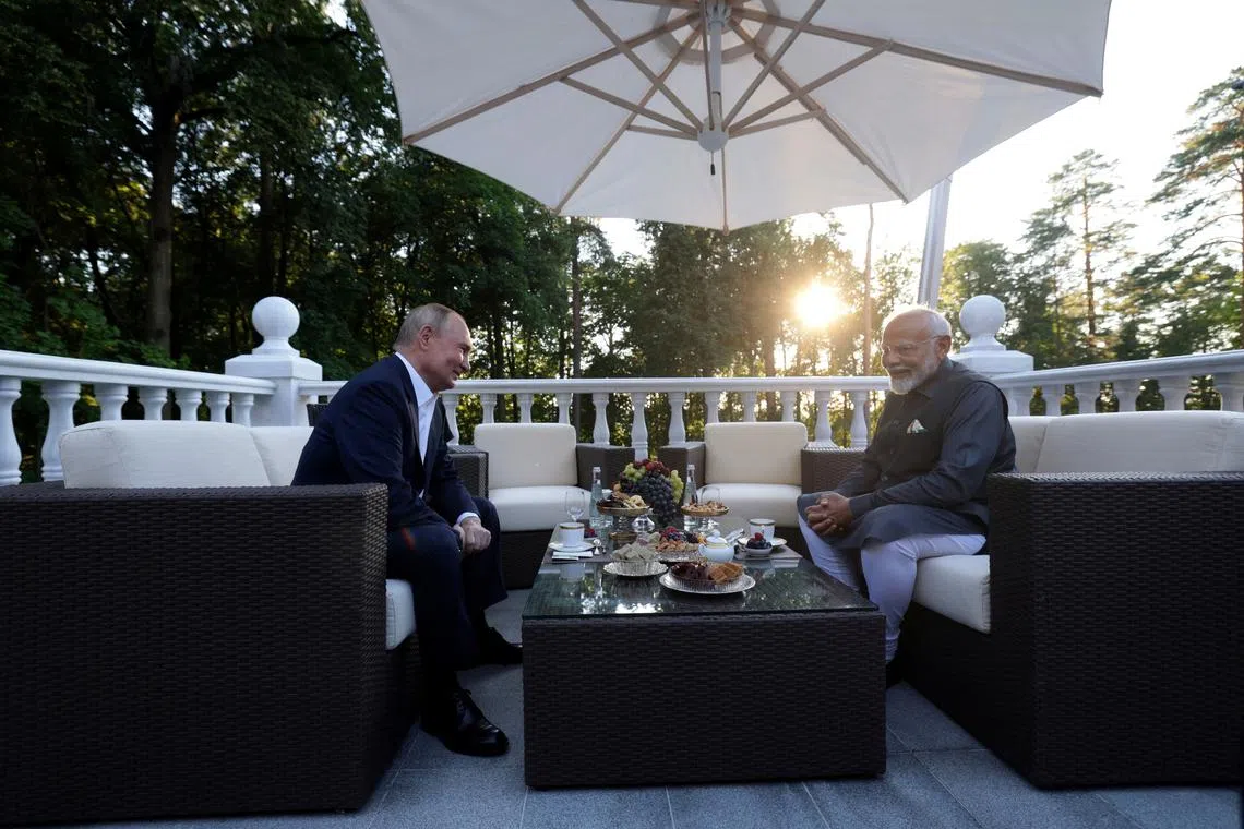 Russia's President Vladimir Putin and India's Prime Minister Narendra Modi attend a meeting at the Novo-Ogaryovo state residence near Moscow, Russia July 8, 2024. Sputnik/Gavriil Grigorov/Pool via REUTERS
