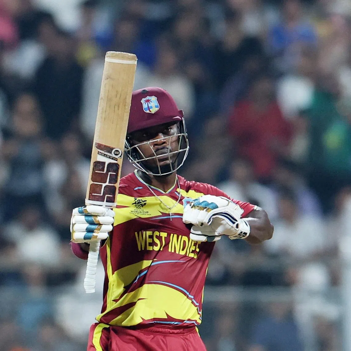 Cricket - ICC Men's T20 World Cup 2026 - Group C - England v West Indies - Wankhede Stadium, Mumbai, India - February 11, 2026 West Indies' Sherfane Rutherford celebrates after reaching his half century REUTERS/Francis Mascarenhas