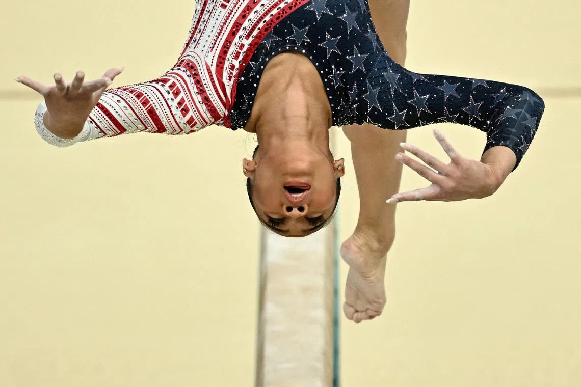 Sunisa Lee of United States in action on the Balance Beam during the Women's Team Final at the Paris 2024 Olympics, held at the Bercy Arena, Paris, France, on July 30, 2024.  