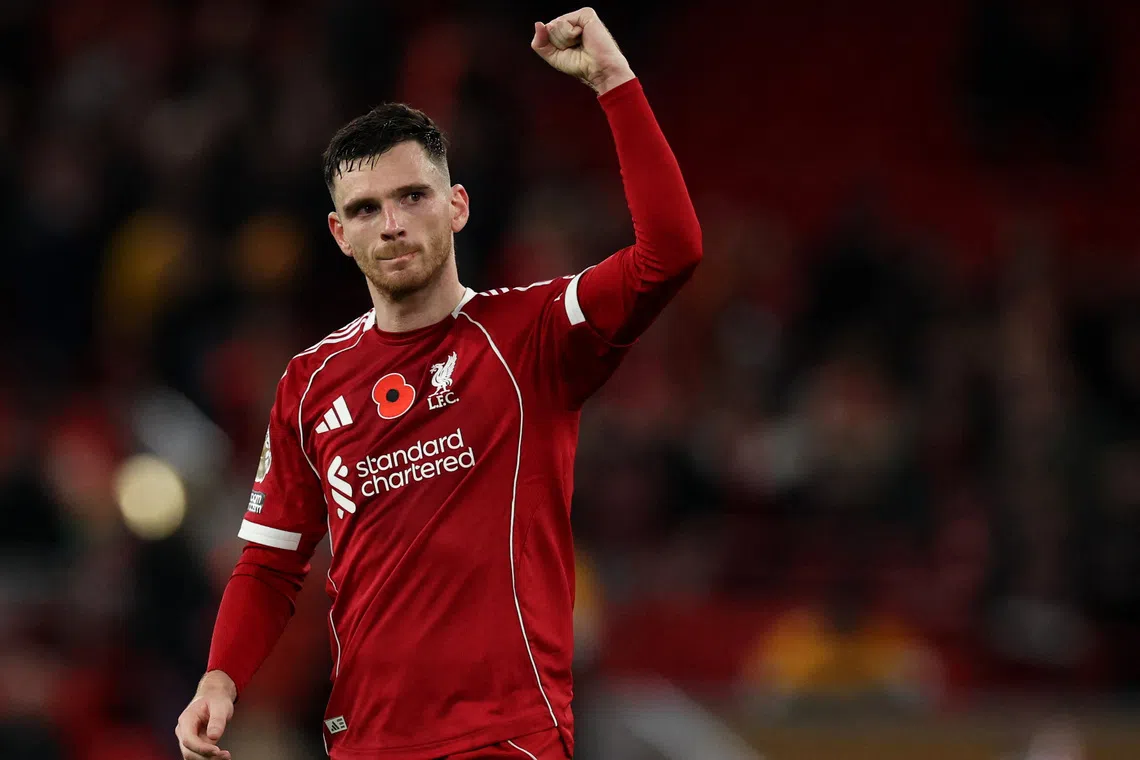 Soccer Football - Premier League - Liverpool v Aston Villa - Anfield, Liverpool, Britain - November 1, 2025 Liverpool's Andy Robertson celebrates after the match REUTERS/Phil Noble