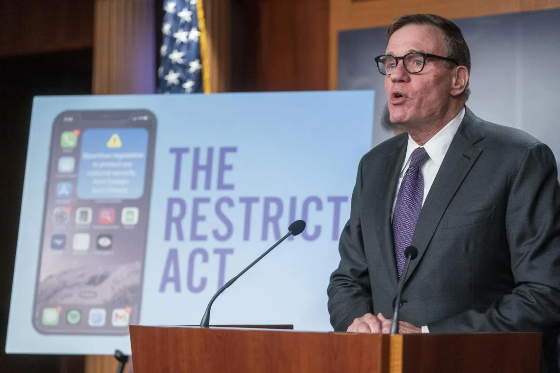 US Senator Mark Warner talks to reporters while introducing the Restrict Act at the US Capitol on March 7, 2023. 