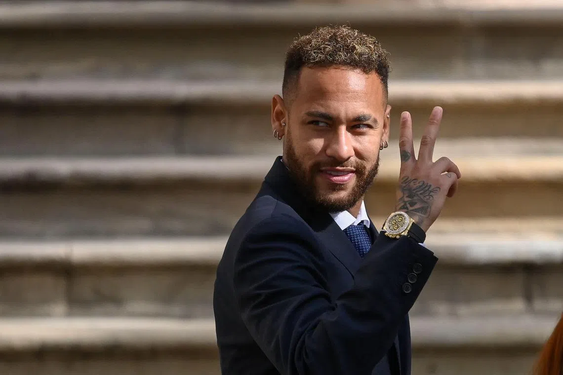 Paris Saint-Germain forward Neymar leaving after attending a hearing at the courthouse in Barcelona on the second day of his trial on Oct 18. Prosecutors in Spain dropped corruption and fraud charges on Oct 28 against Neymar and others accused in a trial over the Brazilian's 2013 move from Santos to Barcelona. The court acquitted them of all charges on Tuesday.