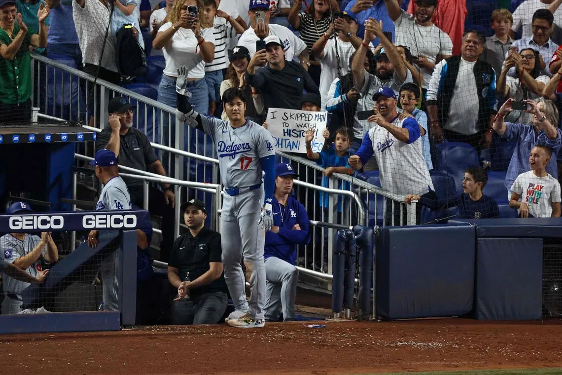 Shohei Ohtani of the Los Angeles Dodgers celebrates in the seventh inning during the game against Miami Marlins.