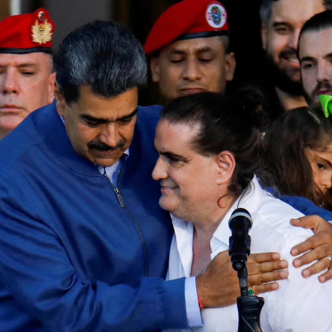 FILE PHOTO: Venezuelan President Nicolas Maduro embraces Alex Saab, who was facing U.S. bribery charges, after he was released by the U.S. government, at the Miraflores Palace, in Caracas, Venezuela, December 20, 2023. REUTERS/Leonardo Fernandez Viloria/File Photo