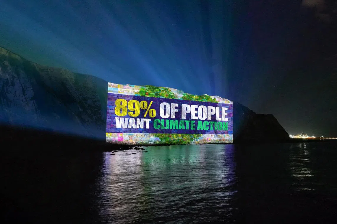 dfmajority - A mosaic image is projected on the cliffs of Dover in England on July 9, 2025. It was created by The People's Picture from 1,500 photos shared by people to illustrate what they want to protect. 

Credit: The People's Picture