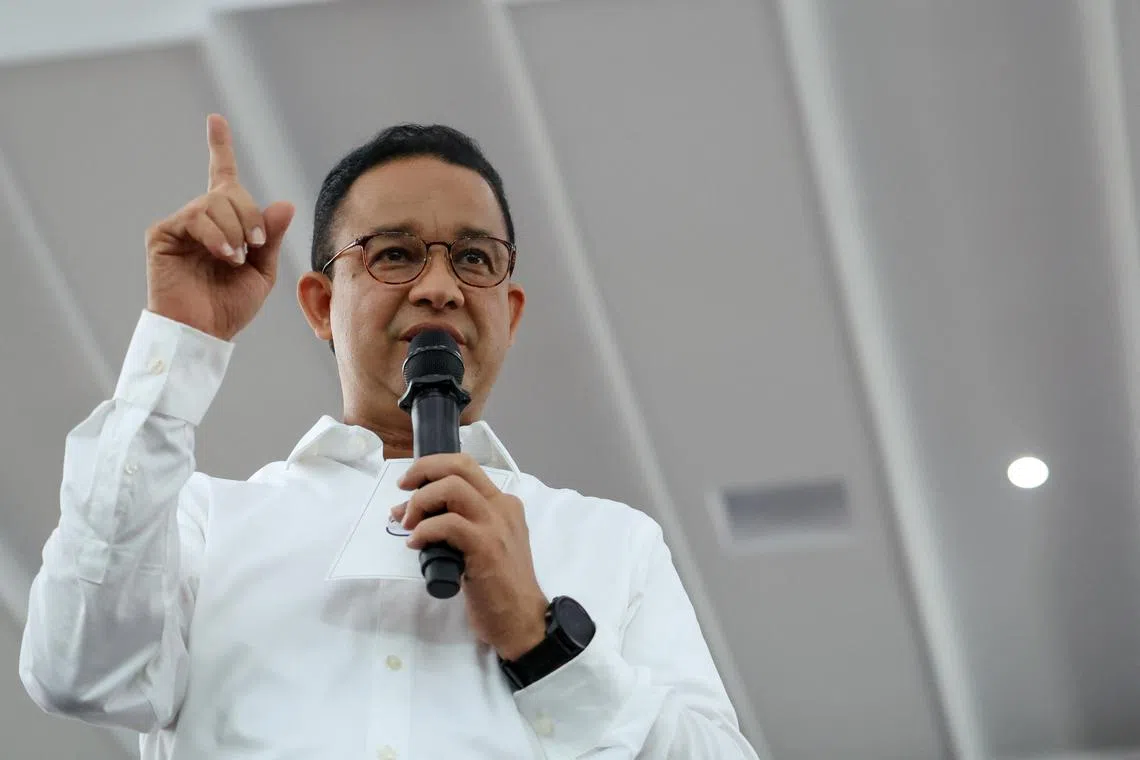 FILE PHOTO: Former Jakarta Governor and presidential candidate Anies Baswedan gestures as he speaks during his campaign at the Islamic Centre in Ciamis, West Java province, Indonesia, January 4, 2024. REUTERS/Ajeng Dinar Ulfiana/File Photo