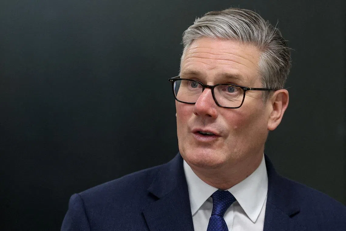 Britain's Prime Minister Keir Starmer meets construction apprentices during a visit to London South Bank Technical College in London, Britain, May 12, 2026.  REUTERS/Toby Melville/Pool/File Photo