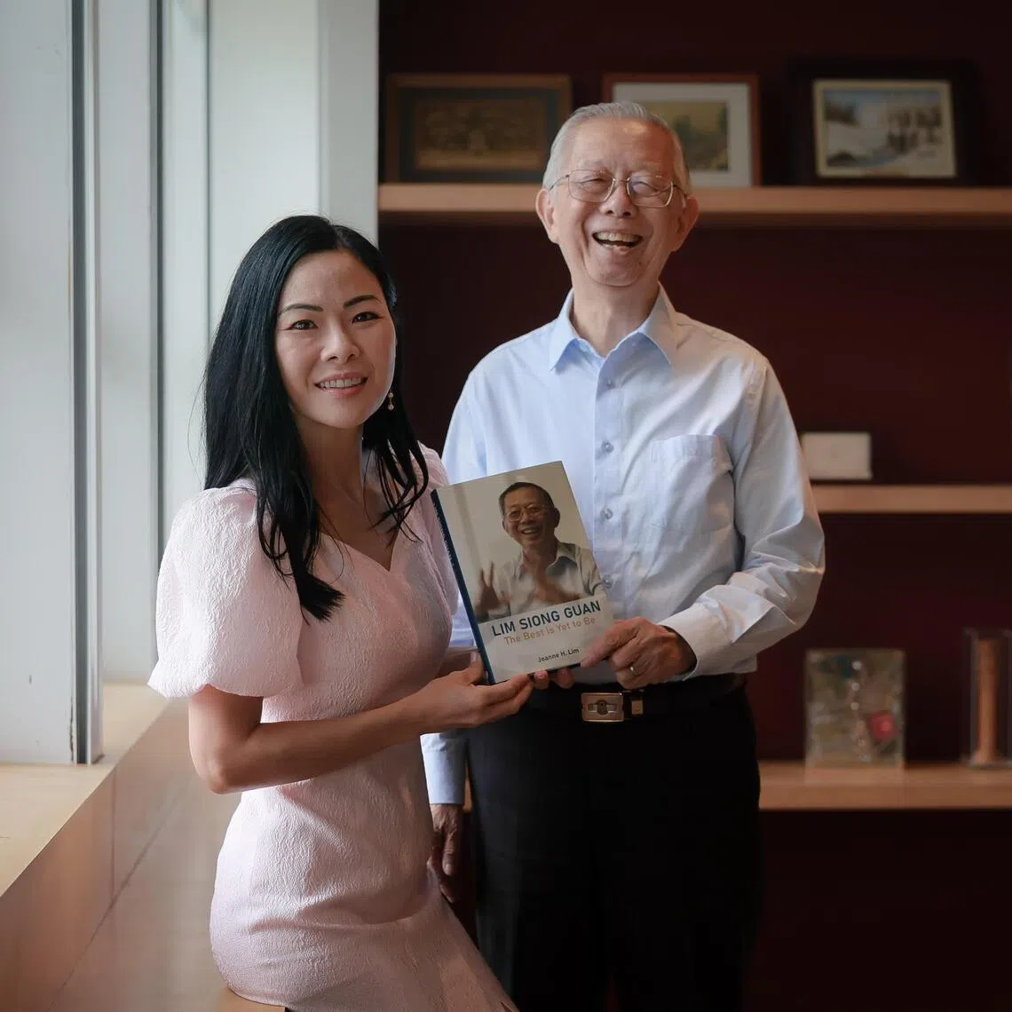 Mr Lim Siong Guan and his daughter Joanne Lim with his new memoir, The Best Is Yet To Be.