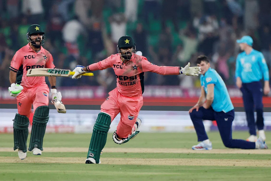 Cricket - Fourth One Day International - Pakistan v England - Gaddafi Stadium, Lahore, Pakistan - October 25, 2026  Pakistan's Haris Rauf and Pakistan's Shadab Khan celebrate after the match REUTERS/Akhtar Soomro     TPX IMAGES OF THE DAY