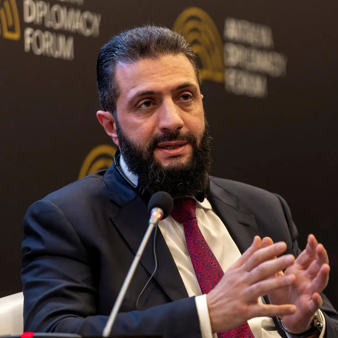 Syrian President Ahmed al-Sharaa speaks during a session at Antalya Diplomacy Forum in Antalya, Turkey, April 17, 2026. REUTERS/Umit Bektas