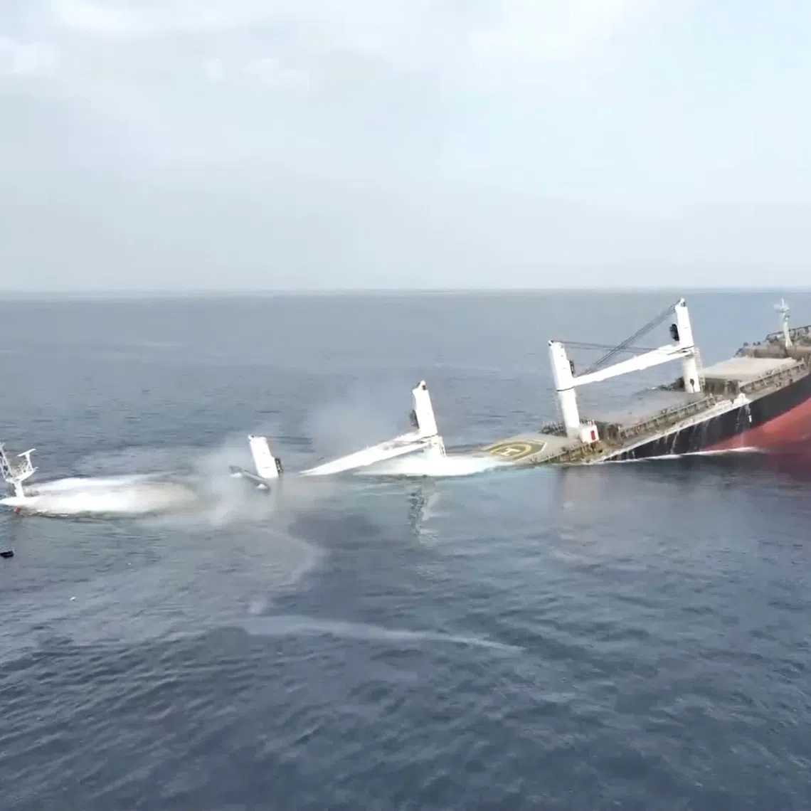 A vessel said to be Greek-operated, Liberia-flagged Eternity C sinks in a footage released by Yemen's Houthis, in the Red Sea, in this screen grab taken from a handout video released on July 9, 2025.    HOUTHI MEDIA CENTER/Handout via REUTERS