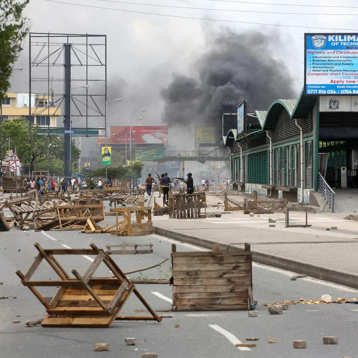 FILE PHOTO: Tanzanian police disperse demonstrators during violent protests that marred the election following the disqualification of the two leading opposition candidates in Dar es Salaam, Tanzania, October 29, 2025. REUTERS/Onsase Ochando/File Photo