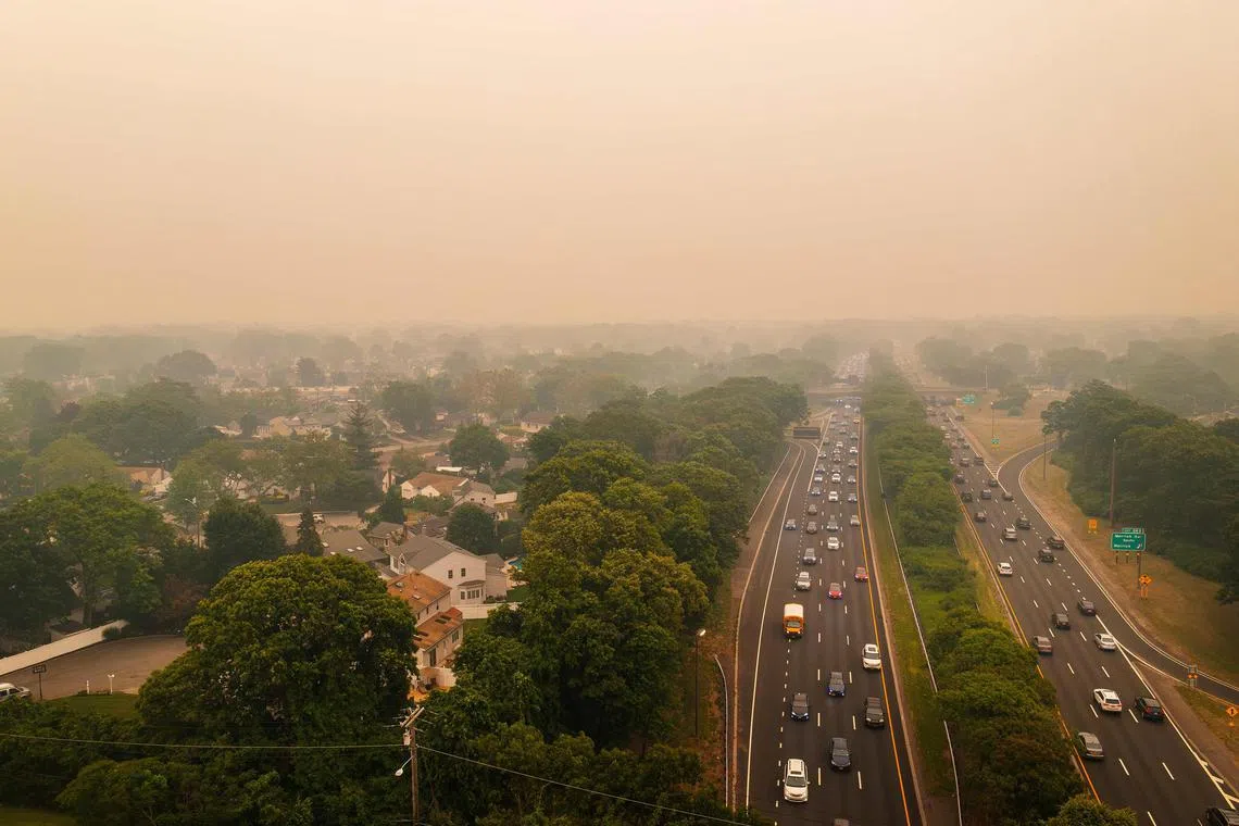 An aerial view of the Southern State Parkway enveloped in a dense haze caused by wildfires in Canada on June 7, 2023.