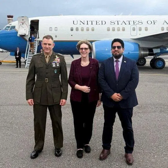From left: Commander of the US Southern Command Francis L. Donovan, US envoy to Venezuela Laura Farnsworth Dogu, and senior Pentagon official Joseph M. Humire posing for a photo in Caracas on Feb 18, 2026. 