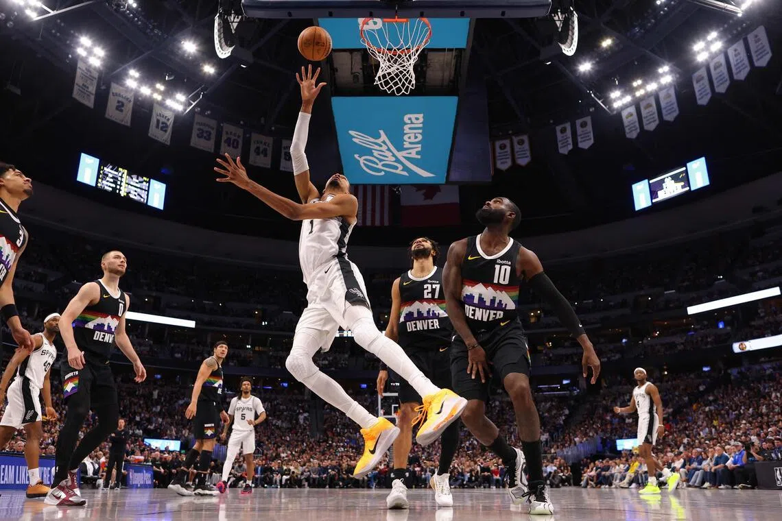 Victor Wembanyama of the San Antonio Spurs scoring in the fourth quarter against the Denver Nuggets at Ball Arena on April 4, 2026 in Colorado. He had 34 points and 18 rebounds in the 136-134 overtime loss.