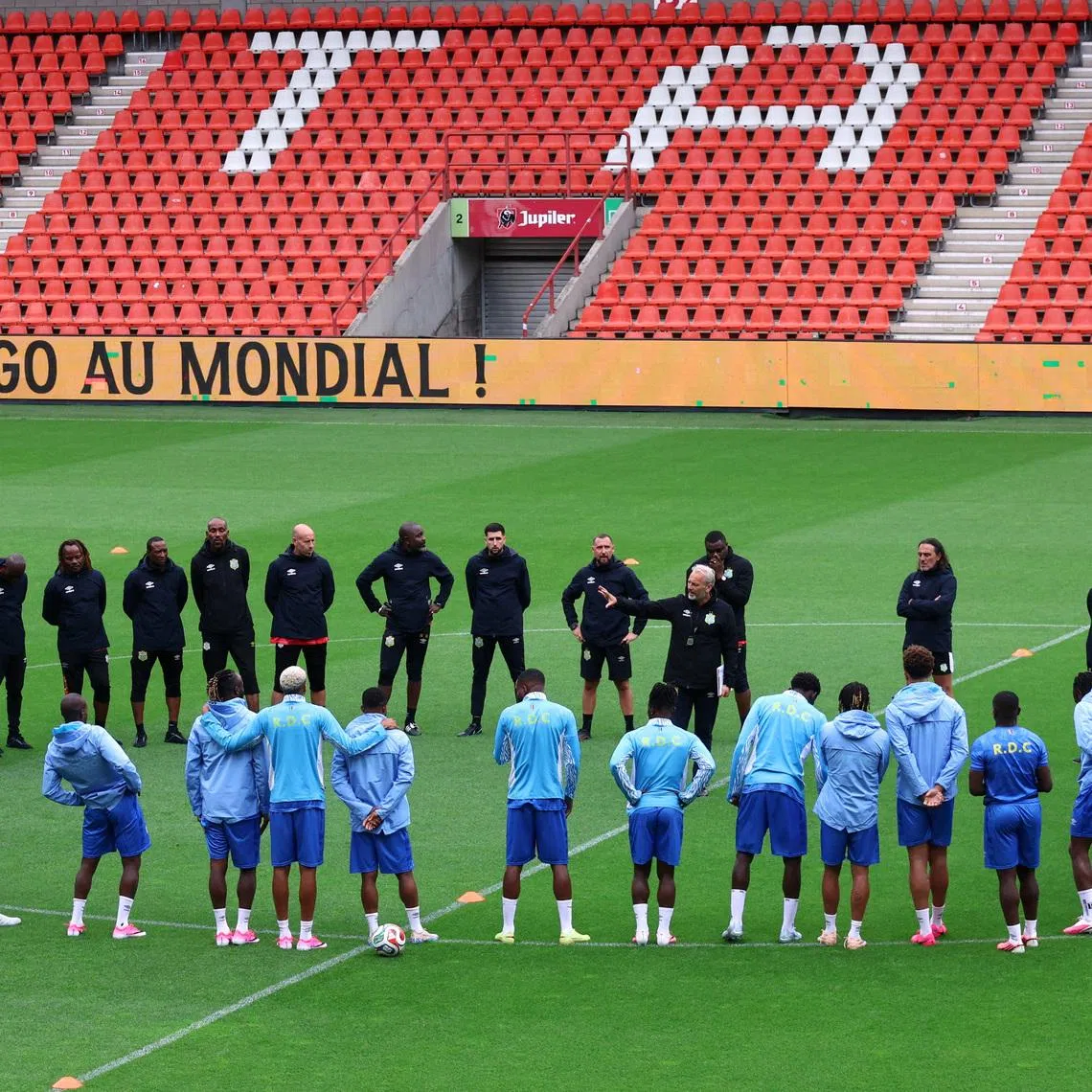 Soccer Football - International Friendly - Democratic Republic of the Congo Training - Stade Maurice Dufrasne, Liege, Belgium - June 2, 2026 Democratic Republic of the Congo coach Sebastien Desabre with players and staff during training REUTERS/Nicolas Economou