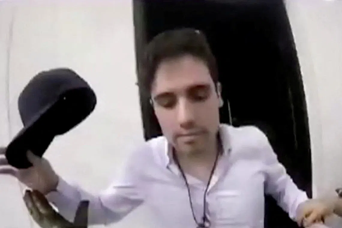 FILE PHOTO: Ovidio Guzman, son of kingpin Joaquin \"El Chapo\" Guzman, is briefly captured by Mexican military police in a residential compound near the centre of Culiacan in the state of Sinaloa, Mexico October 17, 2019 in this still image taken from a helmet camera footage obtained October 30, 2019. Mexican Government TV/Handout via REUTERS/File Photo