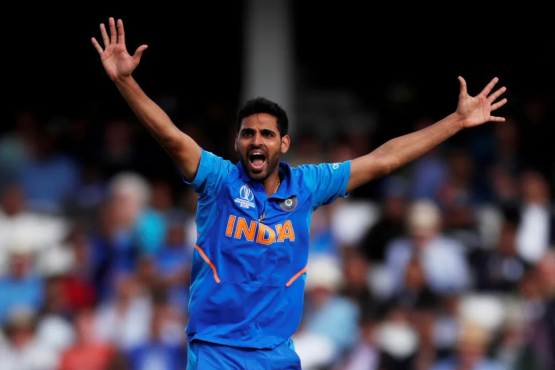 FILE PHOTO: Cricket - ICC Cricket World Cup - India v Australia - The Oval, London, Britain - June 9, 2019    India's Bhuvneshwar Kumar celebrates taking the wicket of Australia's Steve Smith    Action Images via Reuters/Paul Childs/File Photo