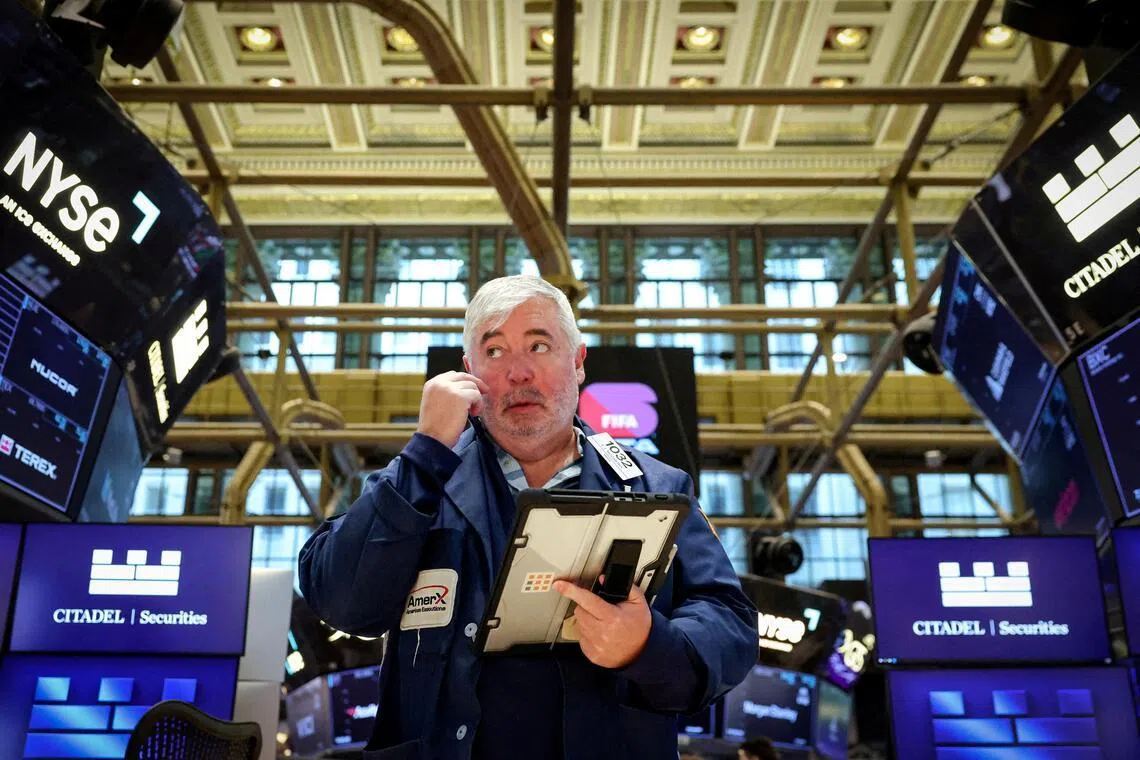 Traders working on the floor of the New York Stock Exchange, in New York City, on March 2.