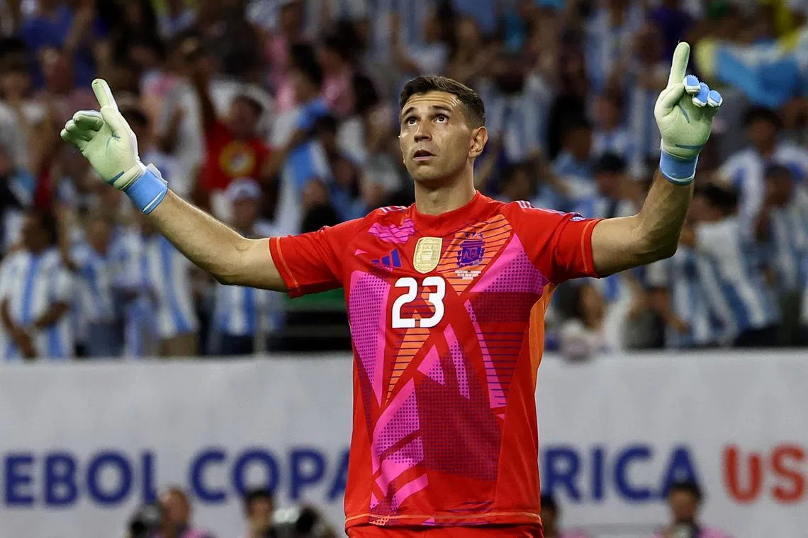 Soccer Football - Copa America 2024 - Quarter Final - Argentina v Ecuador - NRG Stadium, Houston, Texas, United States - July 4, 2024 Argentina's Emiliano Martinez reacts during the penalty shootout REUTERS/Agustin Marcarian