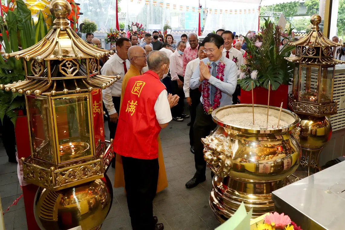 DPM Lawrence Wong hailed the temple for its generosity and commended representatives of the other faiths for turning up for the celebration.