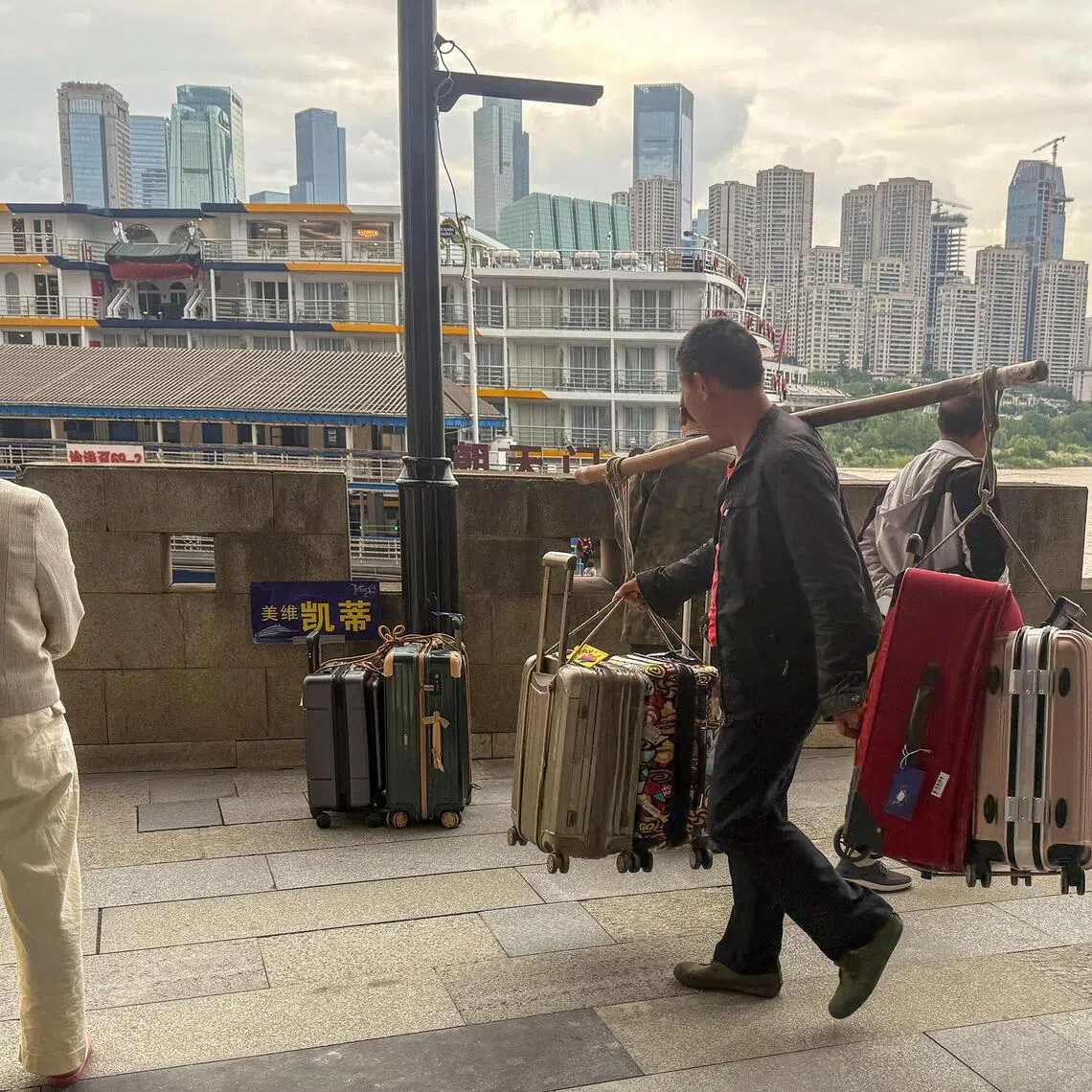 Once a common sight in the city, porters have been increasingly phased out by delivery riders and improvements to Chongqing’s transport system.
