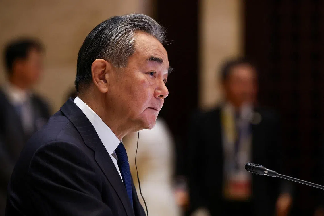 China's Foreign Minister Wang Yi speaks at the 57th ASEAN Foreign Ministers' Meeting at National Convention Center, in Vientiane, Laos, July 26, 2024. REUTERS/Chalinee Thirasupa